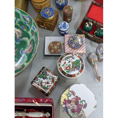 356 - A mixed lot of Oriental items to include Chinese worry balls, cloisonne, bell trinket boxes, ducks a... 