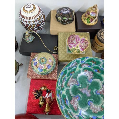 356 - A mixed lot of Oriental items to include Chinese worry balls, cloisonne, bell trinket boxes, ducks a... 