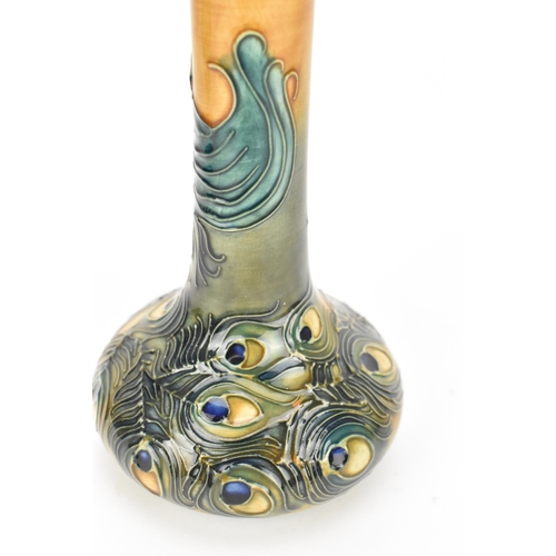 101 - A Moorcroft Pottery 'Phoenix Bird' vase, designed by Rachel Bishop, of compressed form with an elong... 