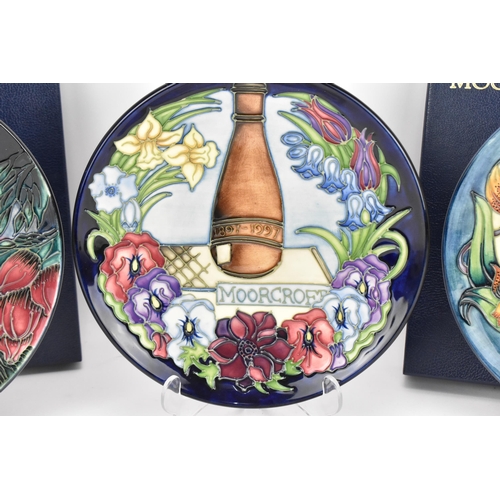 104 - A Moorcroft pottery 'Birth of Light' pattern year plate '2000', designed by Nicola Slaney and Wendy ... 