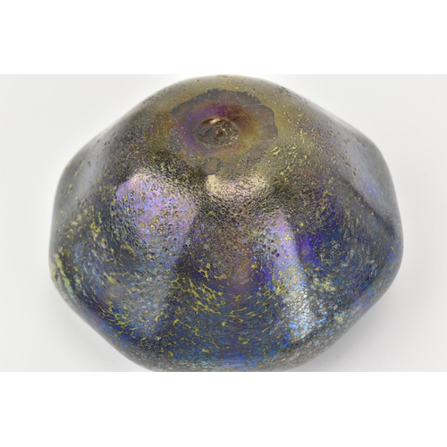 58 - An iridescent studio glass vase, of tapered octagonal form with rounded edges, mottled blue/purple g... 