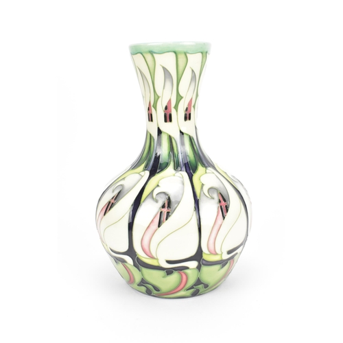 70 - A Moorcroft Pottery vase in the 'Lily Come Home' pattern, designed by Emma Bossons, dated 2006, deco... 