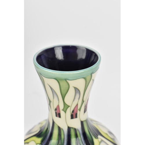 70 - A Moorcroft Pottery vase in the 'Lily Come Home' pattern, designed by Emma Bossons, dated 2006, deco... 