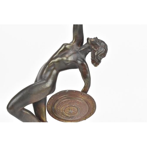 122 - After Raymonde Guerbe (1894-1995) French- a patinated cast spelter model of a nude female warrior ho... 