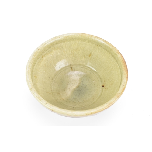 133 - Richard Batterham (1936-2021) British - a studio pottery stoneware bowl with tenmoku glaze and facet... 