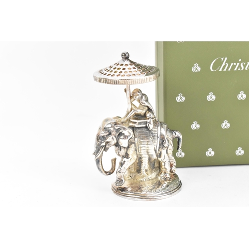 141 - A Christofle silver-plated toothpick holder, modelled as a monkey sat atop an elephant, holding an u... 