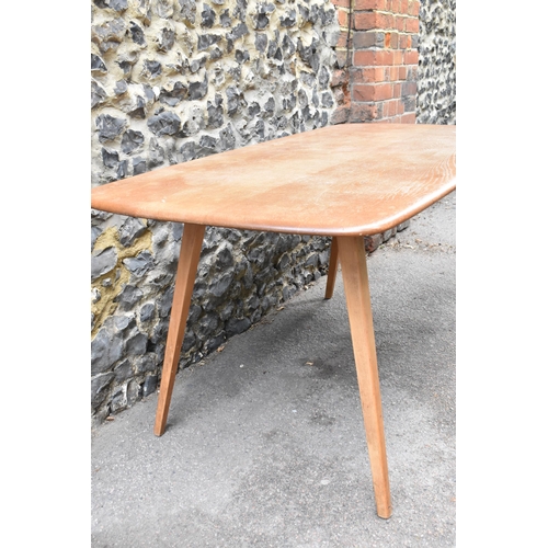 151 - A mid century light elm Ercol dining table and chairs, the table of rectangular form with tapering l... 