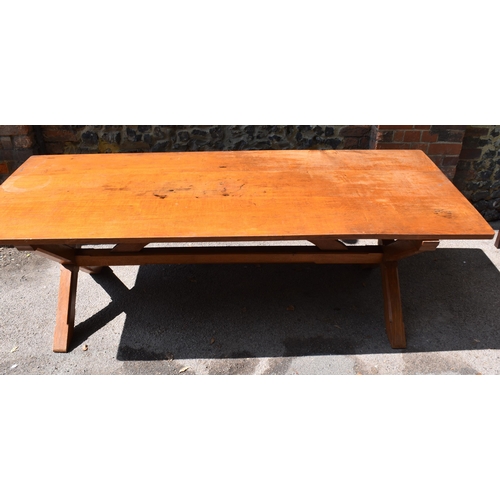 170 - A mid century pine and oak x-frame refectory table, of rectangular form with trestle base, the top s... 