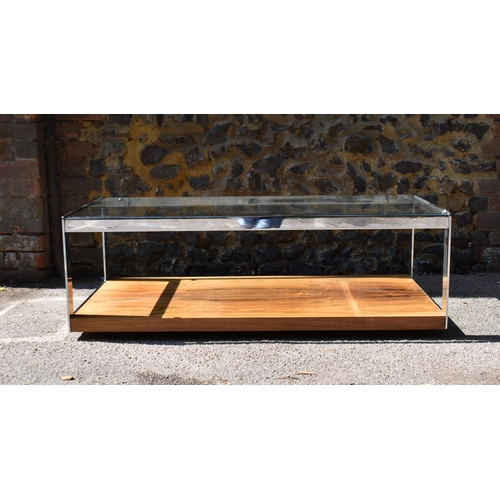 173 - A chrome and veneered wood coffee table by Richard Young for Merrow Associates, of rectangular form,... 