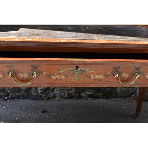 212 - An Edwardian satinwood Carlton House desk, in the Sheraton style, with leather writing surface, flan... 