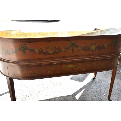 212 - An Edwardian satinwood Carlton House desk, in the Sheraton style, with leather writing surface, flan... 