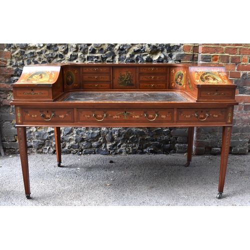 212 - An Edwardian satinwood Carlton House desk, in the Sheraton style, with leather writing surface, flan... 