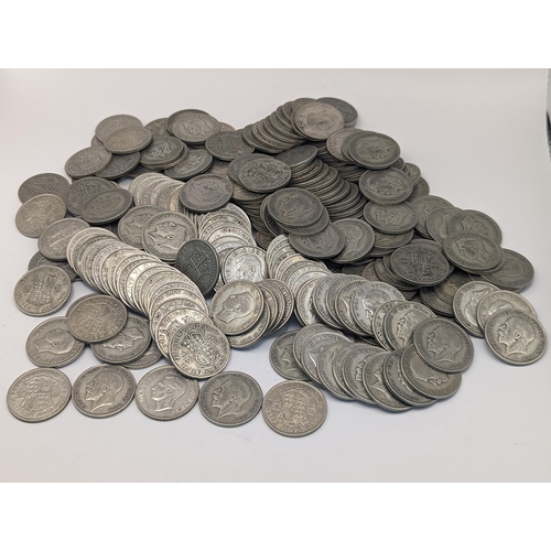 257 - A large collection of George V and VI pre 1947 half crowns, approx 3,090g