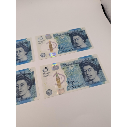 263 - A group of four British polymer £5/five pound notes to include AA01, AE10, AK47 000 and AK47 065