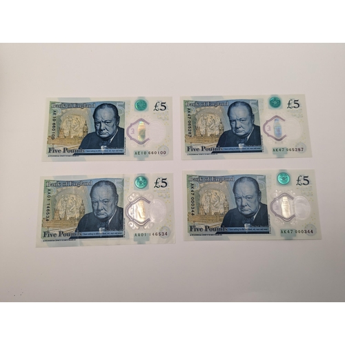 263 - A group of four British polymer £5/five pound notes to include AA01, AE10, AK47 000 and AK47 065