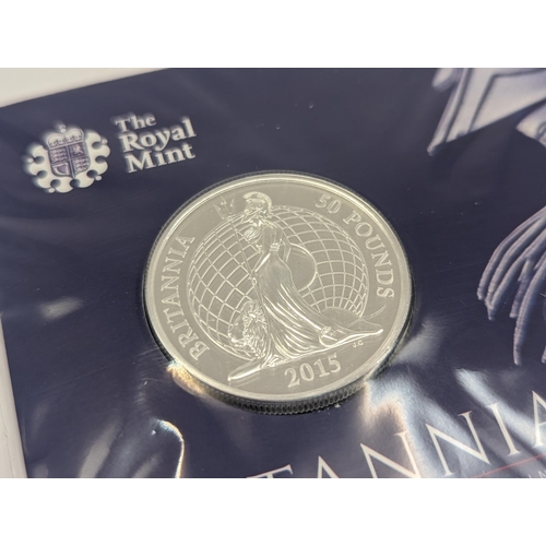 267 - The Royal Mint, 'Britannia' 2015 UK £50 fine silver coin, on the Treasure for Life card presentation