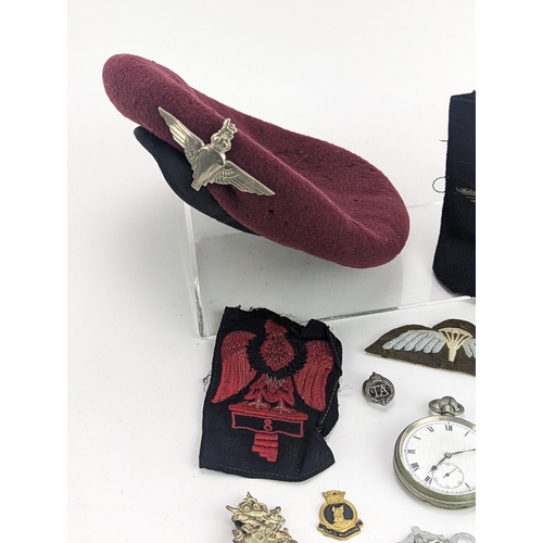 277 - A collection of WWII and later military and other items to include British Parachute Regiment beret,... 