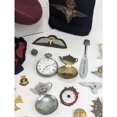 277 - A collection of WWII and later military and other items to include British Parachute Regiment beret,... 