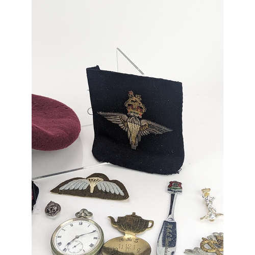 277 - A collection of WWII and later military and other items to include British Parachute Regiment beret,... 