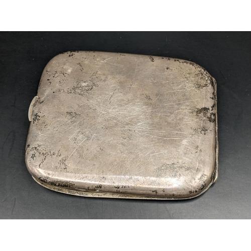 17 - An early 20th century silver cigarette with initials to the front, hallmarked London 1909. Weight 11... 