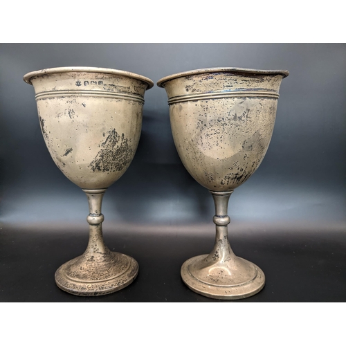 34 - A pair of 1930's silver cups on knopped tapering stems, both with inscriptions, 163.4g
Location:TABL... 