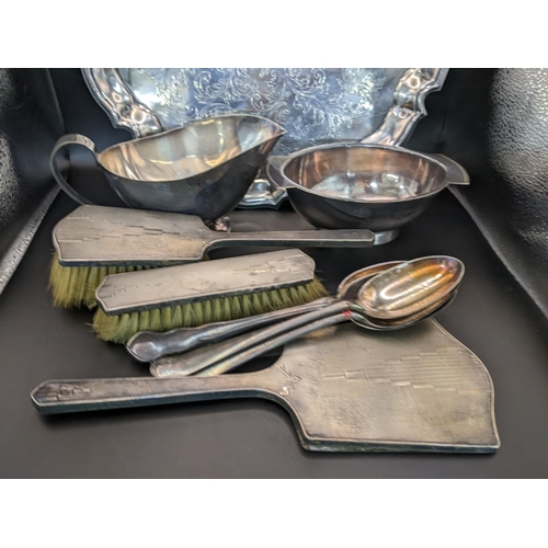 35 - Mixed silver plate to include an engraved tray, together with a silver three piece dressing table se... 