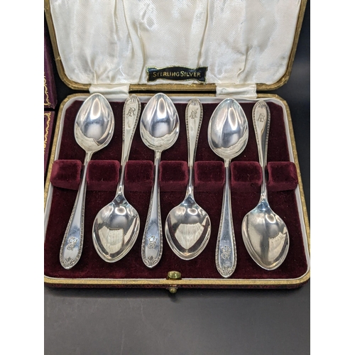 58 - Silver to include a shell terminal fork and spoon and a set of six teaspoons, initialled, total 144g... 