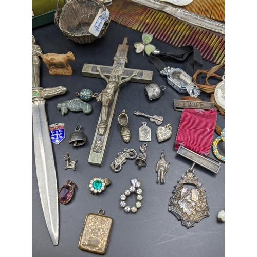 61 - A mixed lot of silver, white metal and costume jewellery to include a silver golf tea together with ... 