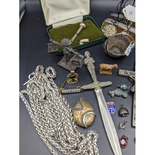 61 - A mixed lot of silver, white metal and costume jewellery to include a silver golf tea together with ... 