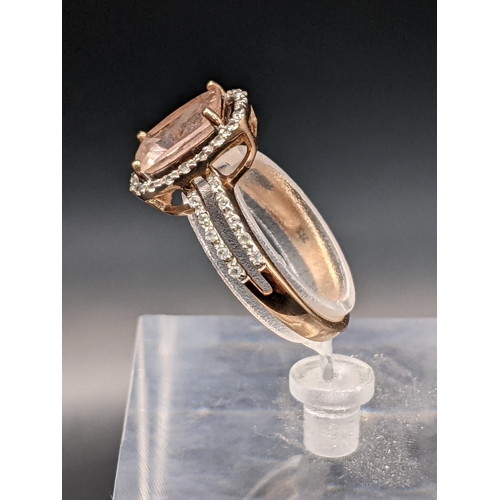 80 - THIS LOT IS WITHDRAWN
A 9ct gold Morganite and white sapphire ring 2.9g Location:RING