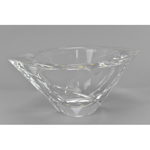 130 - A Swedish Orrefors glass bowl, with etched signature to underside, 20.5 cm wide, together with two S... 