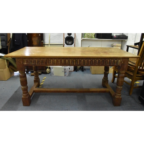 205 - A 20th century limed oak farm table, possibly by Heals, 74.5 cm high x 168 cm long x 75 cm wide