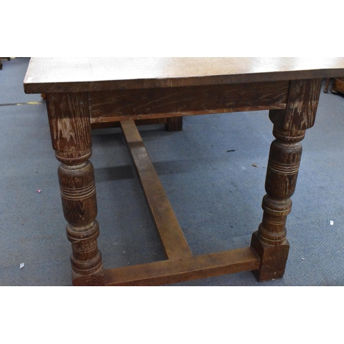 205 - A 20th century limed oak farm table, possibly by Heals, 74.5 cm high x 168 cm long x 75 cm wide