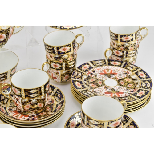 220 - A Royal Crown Derby Imari 2451 pattern tea set, 1925, comprising a teapot, milk jug, sugar bowl, twe... 