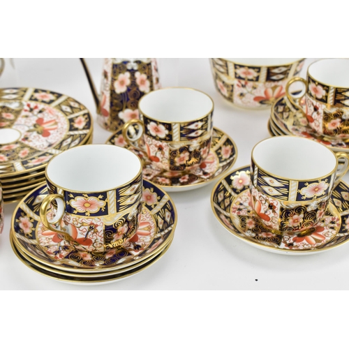 220 - A Royal Crown Derby Imari 2451 pattern tea set, 1925, comprising a teapot, milk jug, sugar bowl, twe... 