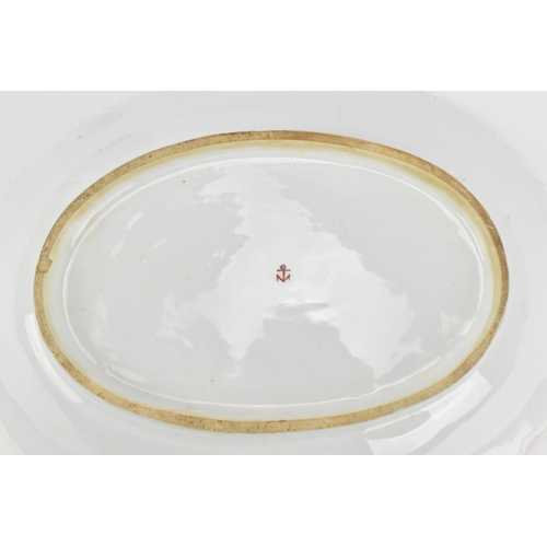 222 - A Chelsea red anchor period moulded porcelain dish, circa 1752-56, 27.5 cm wide, together with a Wor... 