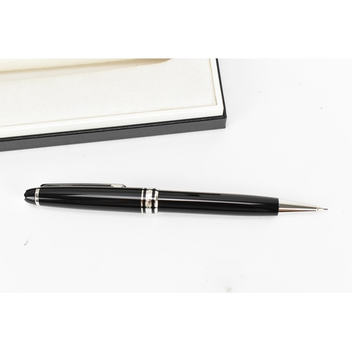 230 - A boxed Montblanc Meisterstück classique mechanical pencil 0.7mm, in original box with service guide... 