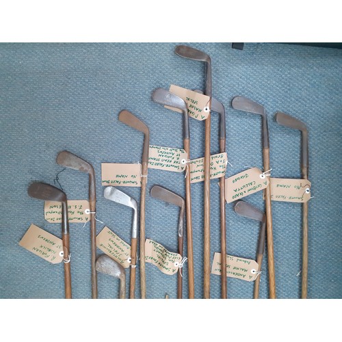 491 - A collection of vintage golfing irons to include a Gibson & Gadd Calcutta jigger, various smooth fac... 