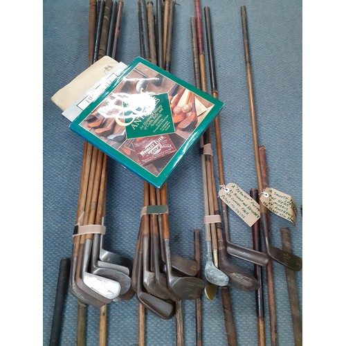 491 - A collection of vintage golfing irons to include a Gibson & Gadd Calcutta jigger, various smooth fac... 