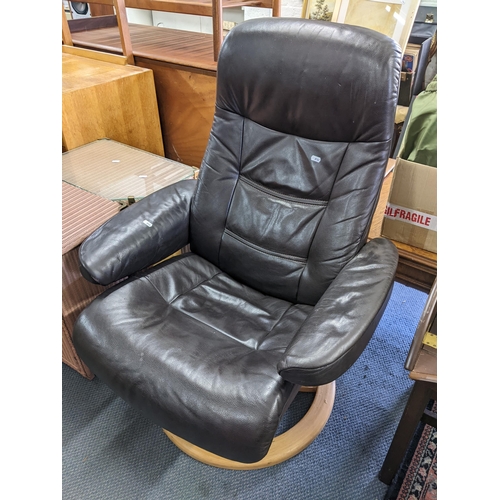 347 - A Stressless leather upholstered swivel and reclining armchair
Location:RAF