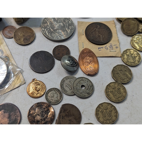 351 - A mixed lot to include early to mid 20th century coinage to include 1930s threepence and later Churc... 