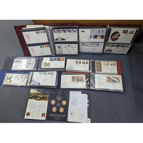 494 - A collection of First Day covers to include the Royal Mail First Day covers album and others to incl... 