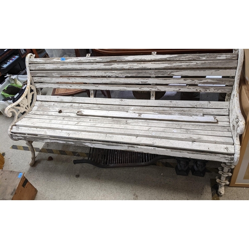 496 - THIS LOT HAS BEEN WITHDRAWN

A Victorian Coalbrookdale style cast iron bench having a white painted ... 