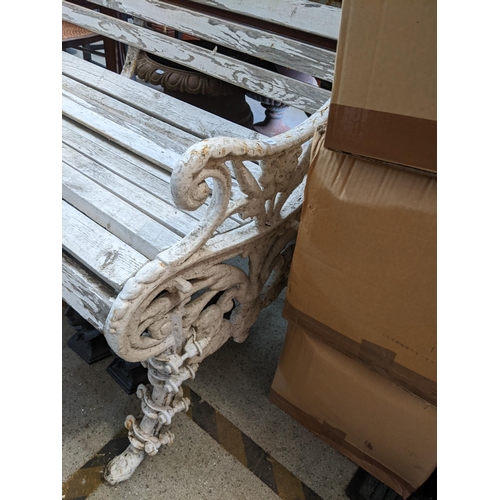 496 - THIS LOT HAS BEEN WITHDRAWN

A Victorian Coalbrookdale style cast iron bench having a white painted ... 