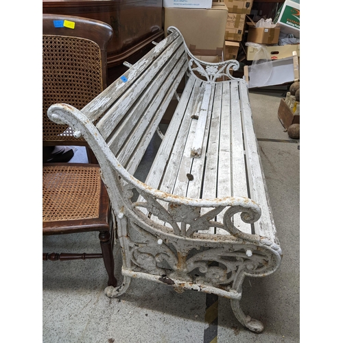 496 - THIS LOT HAS BEEN WITHDRAWN

A Victorian Coalbrookdale style cast iron bench having a white painted ... 