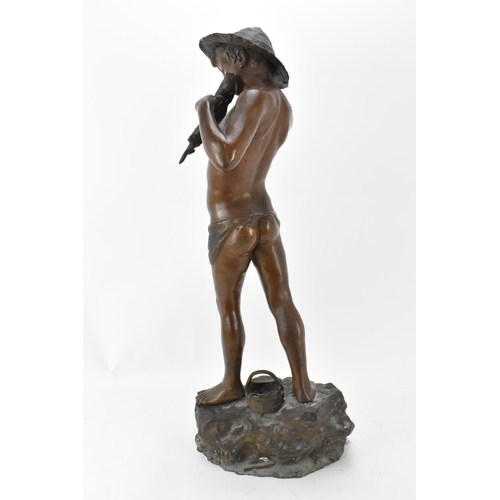 237 - A late 19th/early 20th century patinated bronze of a fisherboy in the style of Giovanni Varlese (188... 