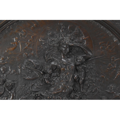 238 - A large patinated Classical charger, late 19th century, with relief scene, possibly of the Birth of ... 