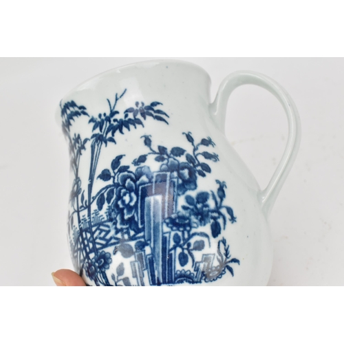 242 - An 18th century Worcester plantation pattern tankard, of baluster form with hoop handle, the body wi... 