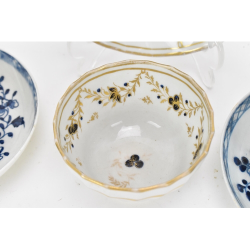 245 - A small collection of English late 18th century tea bowls and saucers, to include a Liverpool Pennin... 