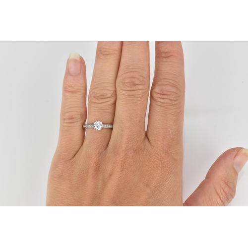 286 - A platinum and solitaire diamond engagement ring, designed with central brilliant cut stone approx. ... 